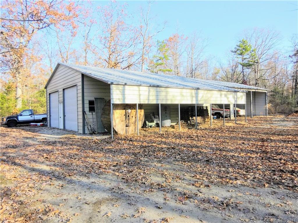 6925 Shelf Road Marshville, NC 28103 - Photo 7 of 24 a front view of a house with garden