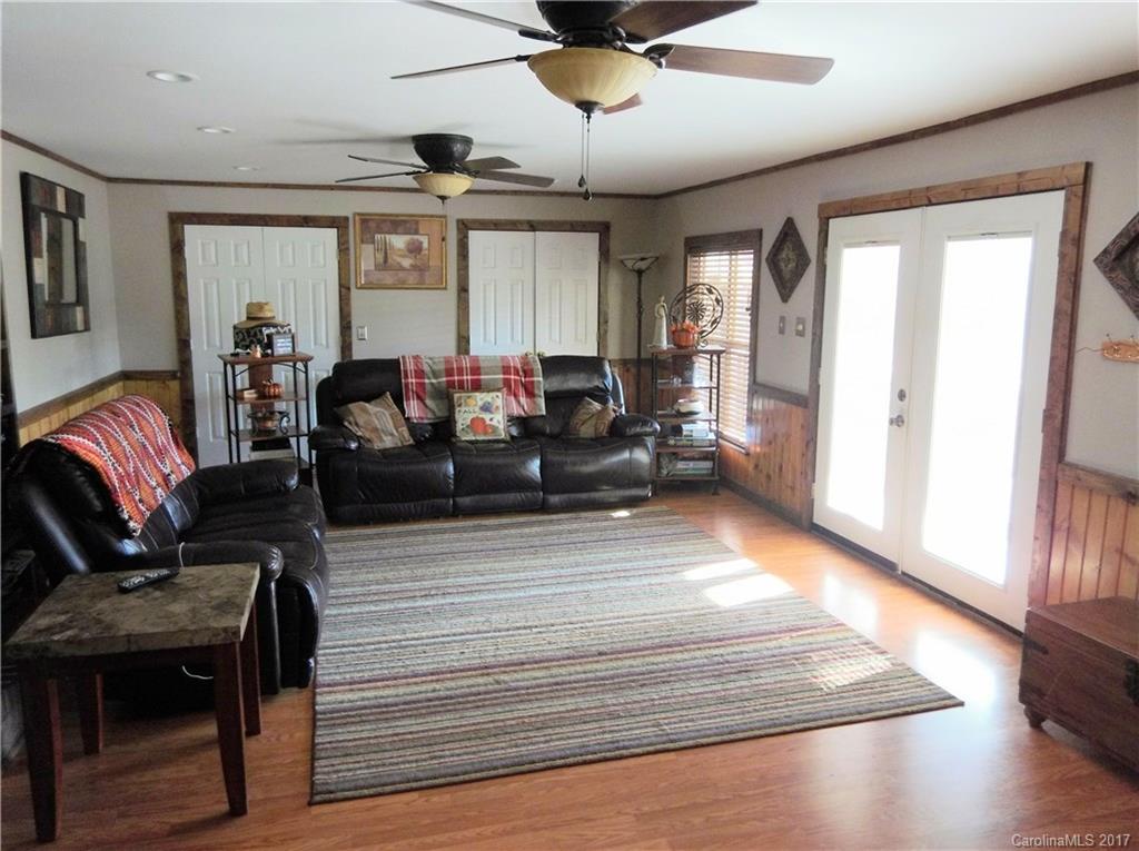 6925 Shelf Road Marshville, NC 28103 - Photo 10 of 24 a living room with furniture and a wooden floor