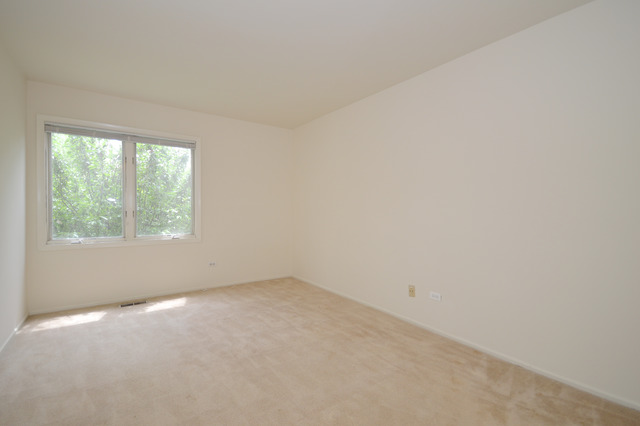 244 Inverrary Lane Deerfield, IL 60015 - Photo 7 of 17 an empty room with a window