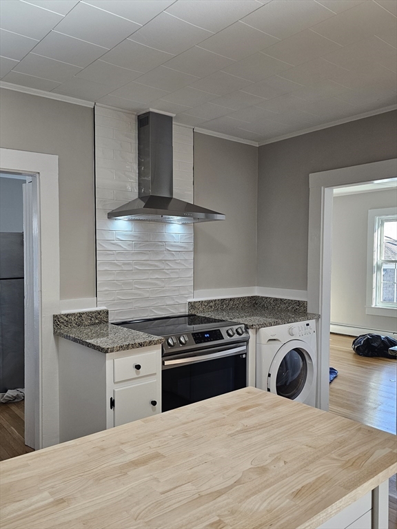 23 Ingalls Terrace, Unit 2 Swampscott, MA 01907 - Photo 4 of 24 a kitchen with a stove and a kitchen
