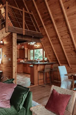 a kitchen with wooden cabinets and a stove top oven