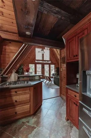 a kitchen with a large window
