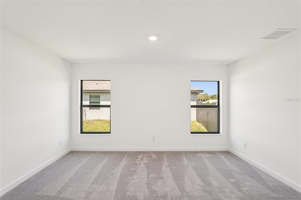 5237 Aberback Street North Port, FL 34291 - Photo 30 of 46 an empty room with windows
