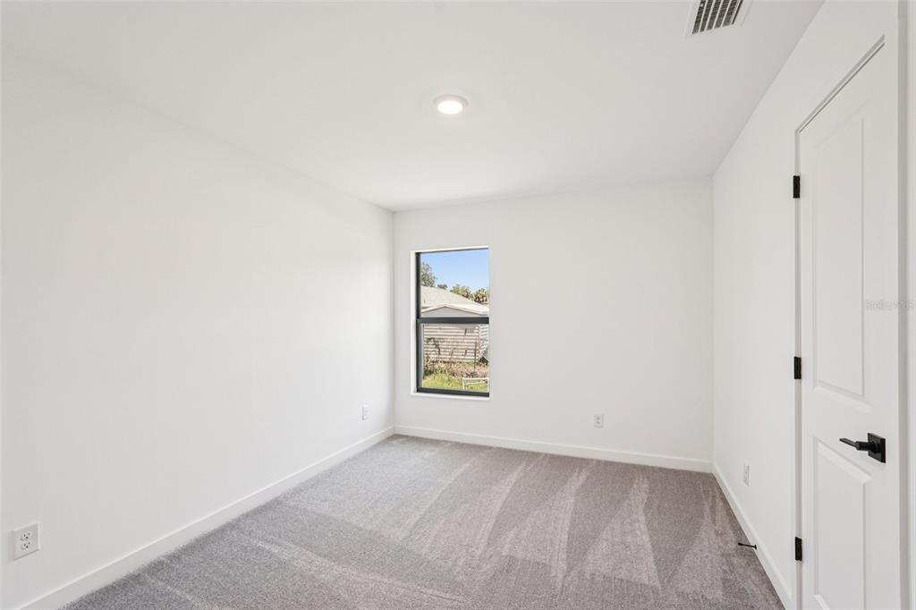 5237 Aberback Street North Port, FL 34291 - Photo 37 of 46 a view of an empty room and a window