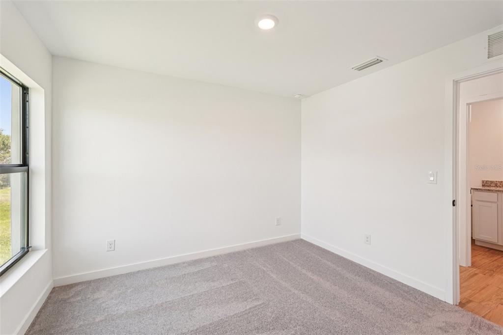 5237 Aberback Street North Port, FL 34291 - Photo 41 of 46 an empty room with a window