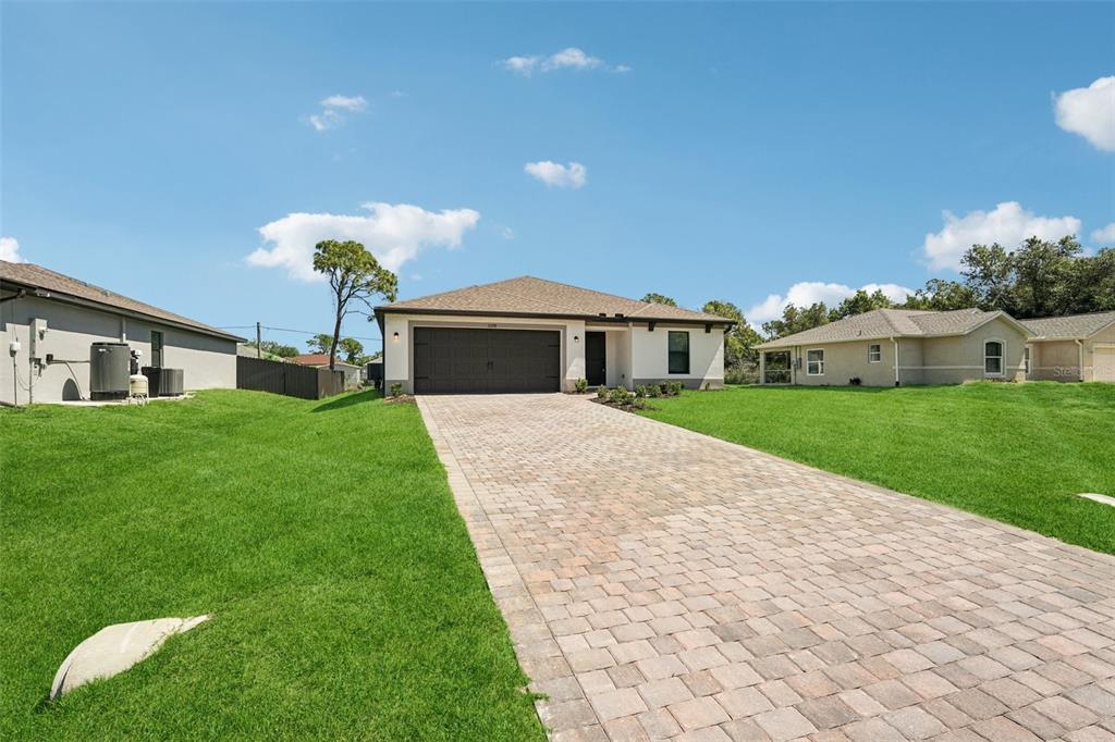 5237 Aberback Street North Port, FL 34291 - Photo 8 of 46 a front view of house with yard