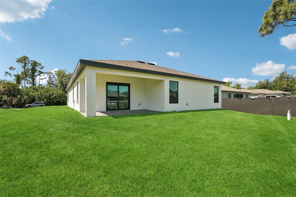 5237 Aberback Street North Port, FL 34291 - Photo 10 of 46 a view of a house with backyard