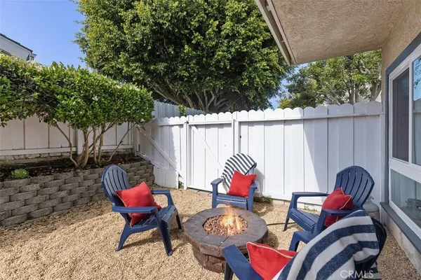 a backyard of a house with seating space