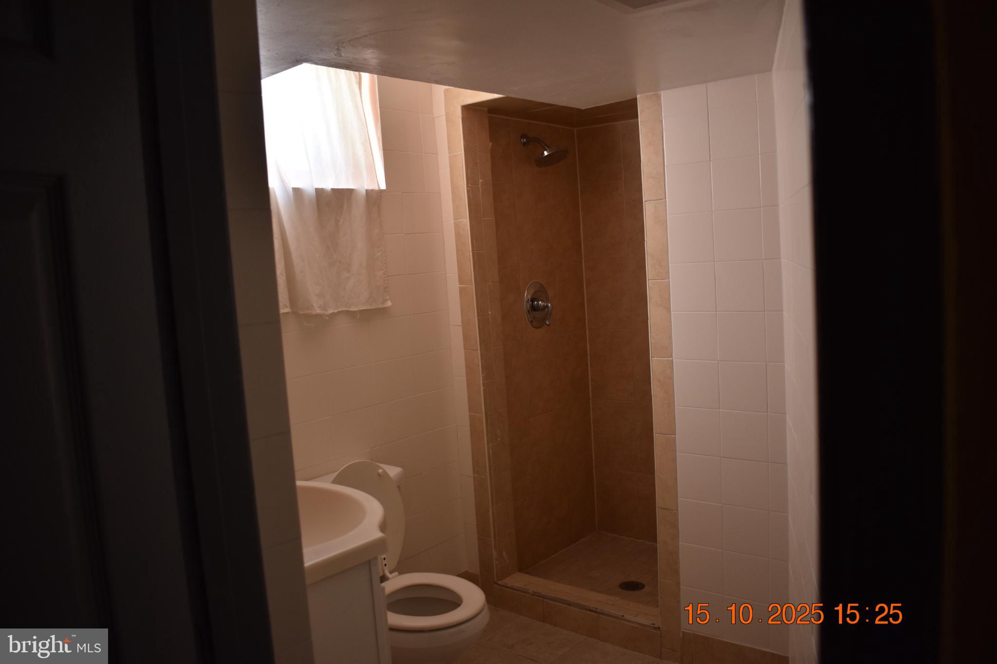 3425 Rutgers Street Hyattsville, MD 20783 - Photo 9 of 10 Modern bathroom with natural light.