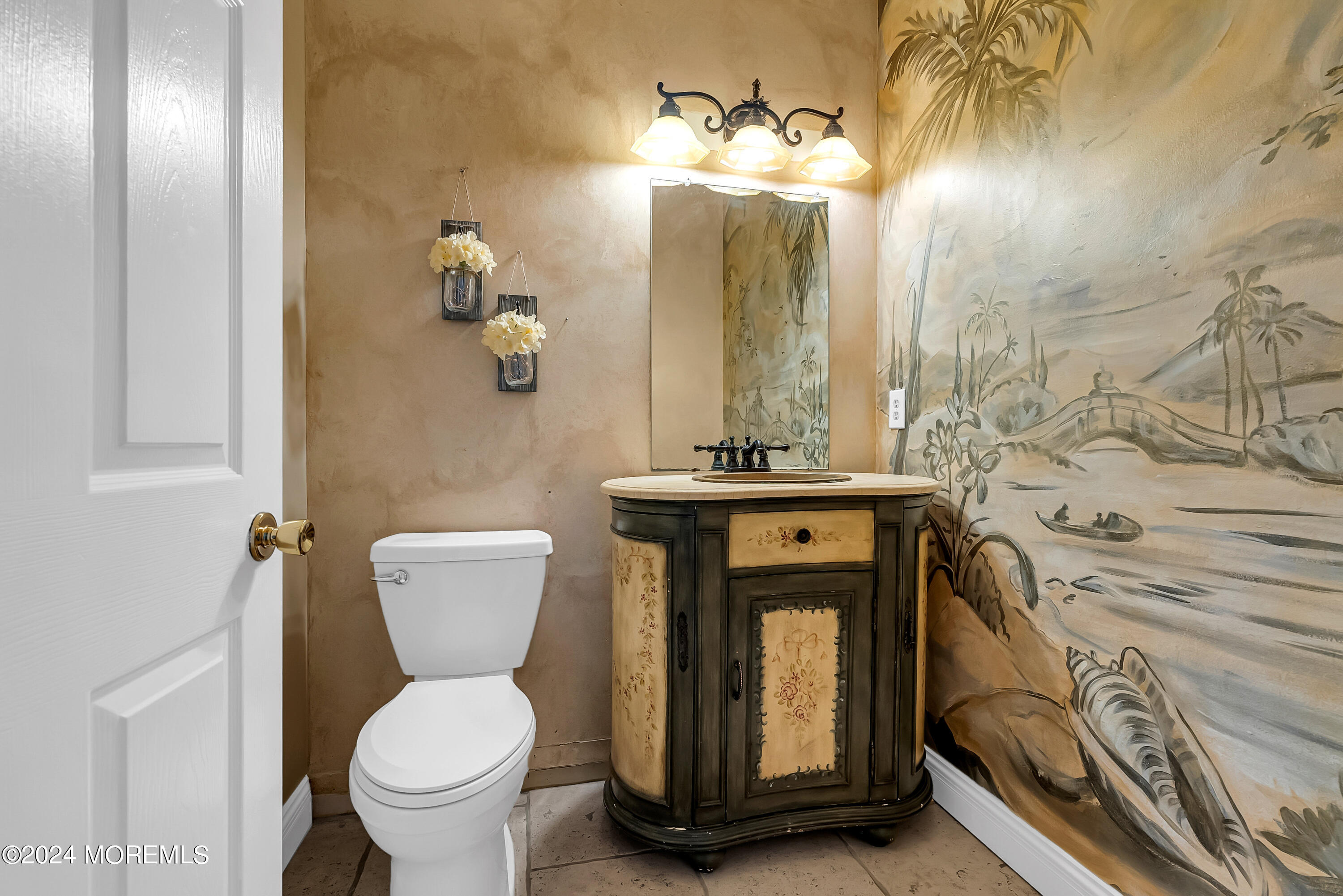 17 Gristmill Road Howell, NJ 07731 - Photo 16 of 71 a bathroom with a toilet sink and mirror