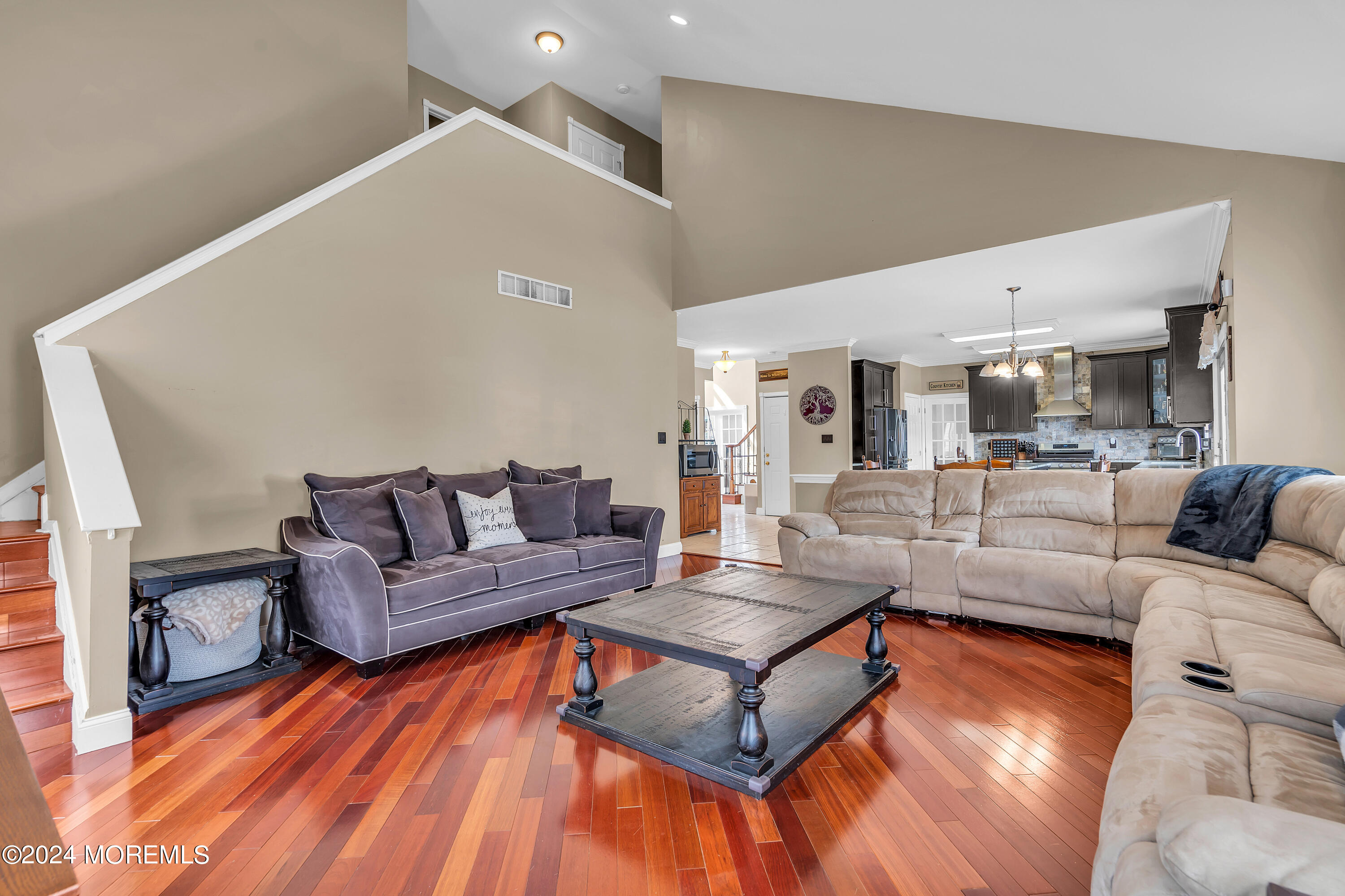 17 Gristmill Road Howell, NJ 07731 - Photo 20 of 71 a living room with furniture and a wooden floor