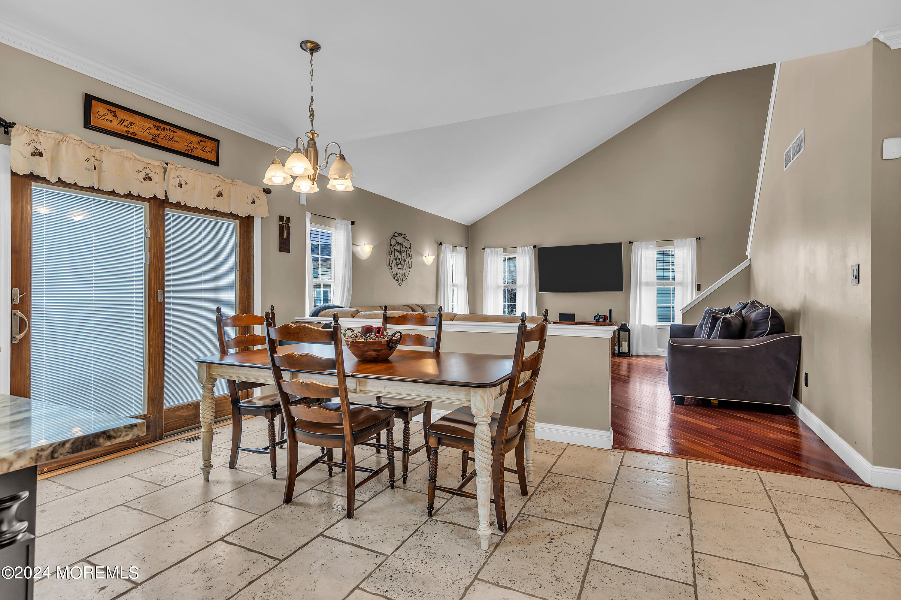 17 Gristmill Road Howell, NJ 07731 - Photo 25 of 71 a view of a dining room with furniture and chandelier