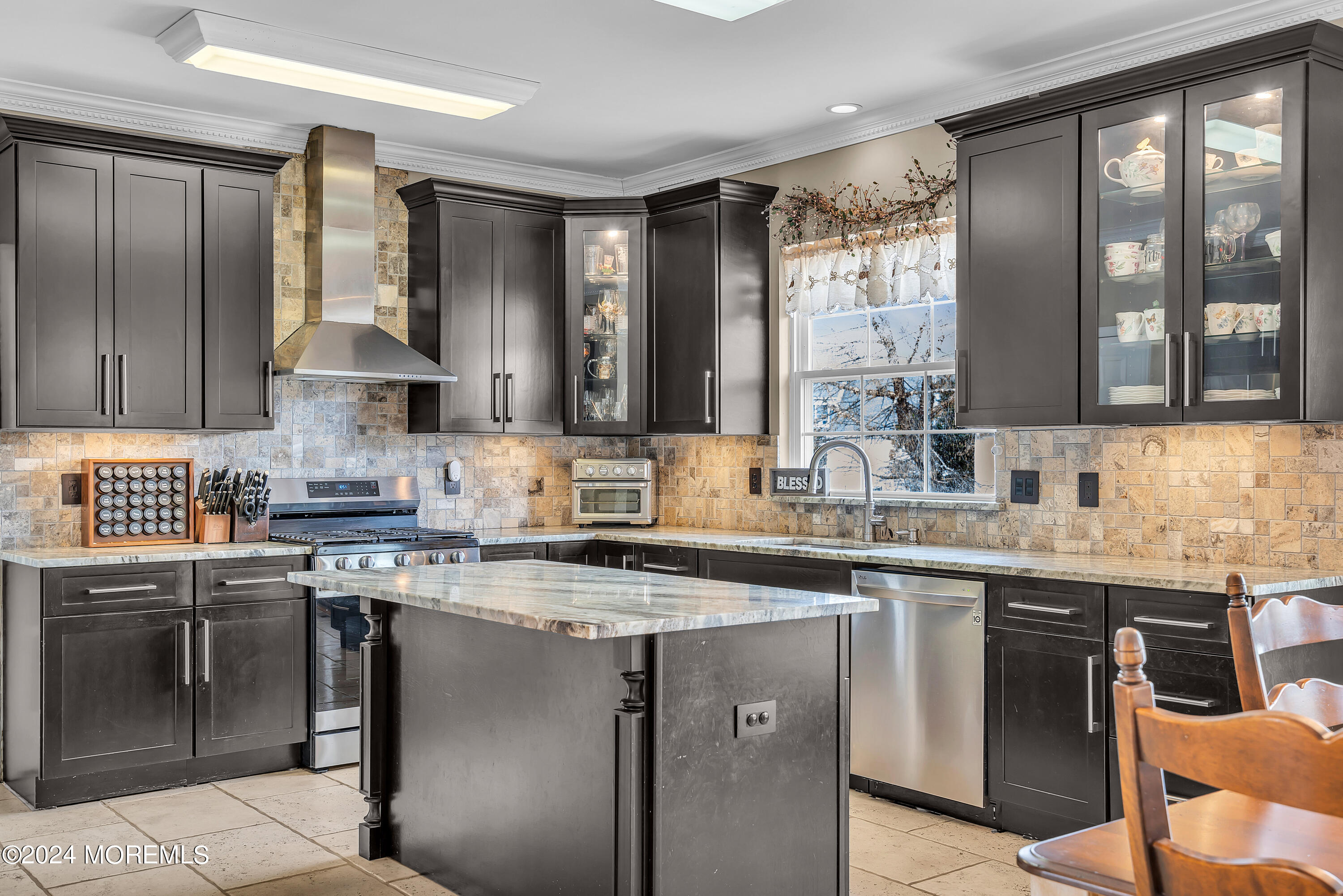 17 Gristmill Road Howell, NJ 07731 - Photo 27 of 71 a kitchen with stainless steel appliances granite countertop a stove sink and cabinets