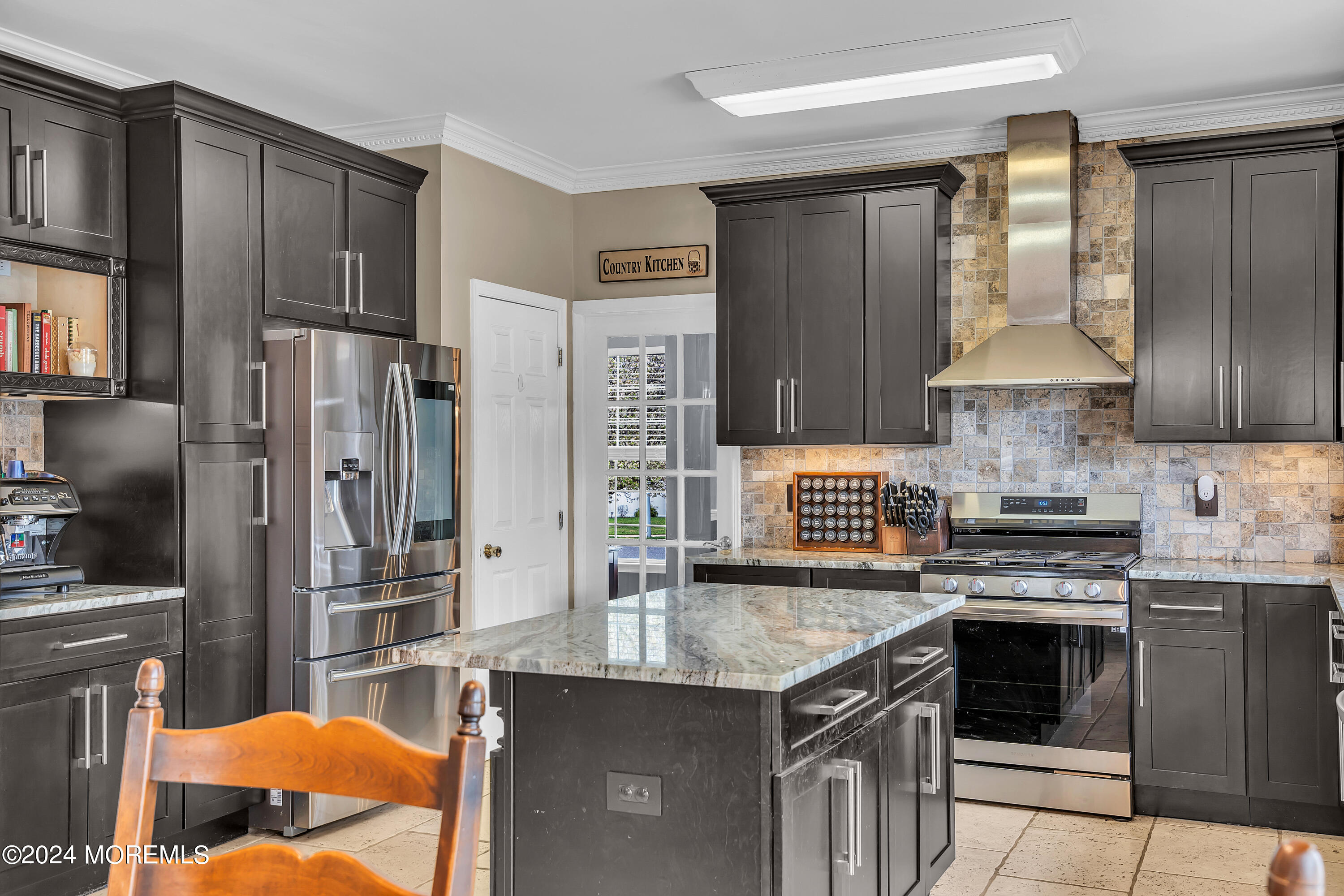 17 Gristmill Road Howell, NJ 07731 - Photo 29 of 71 a kitchen with stainless steel appliances granite countertop a stove refrigerator and cabinets