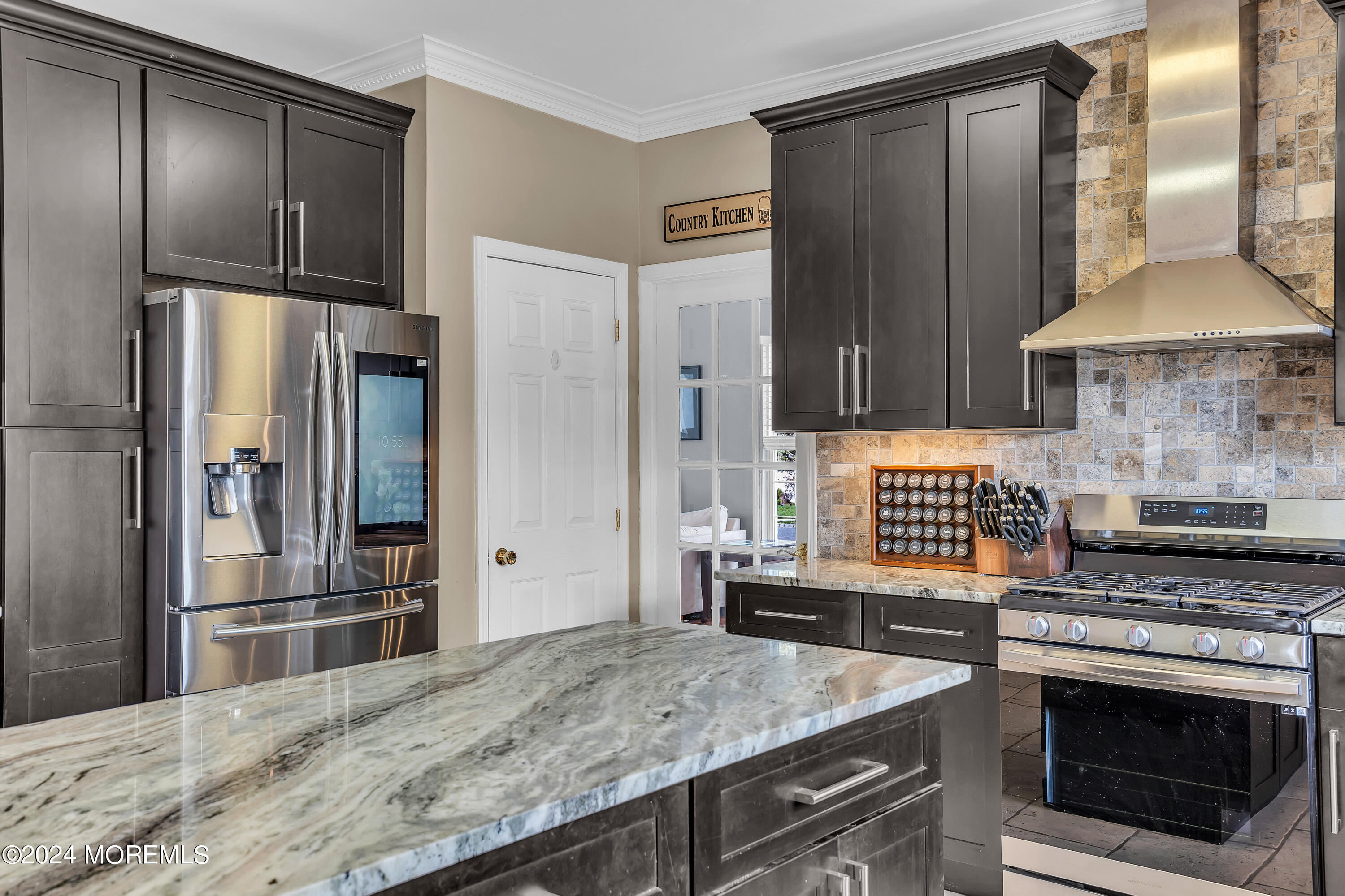 17 Gristmill Road Howell, NJ 07731 - Photo 32 of 71 a kitchen with stainless steel appliances granite countertop a stove refrigerator and microwave