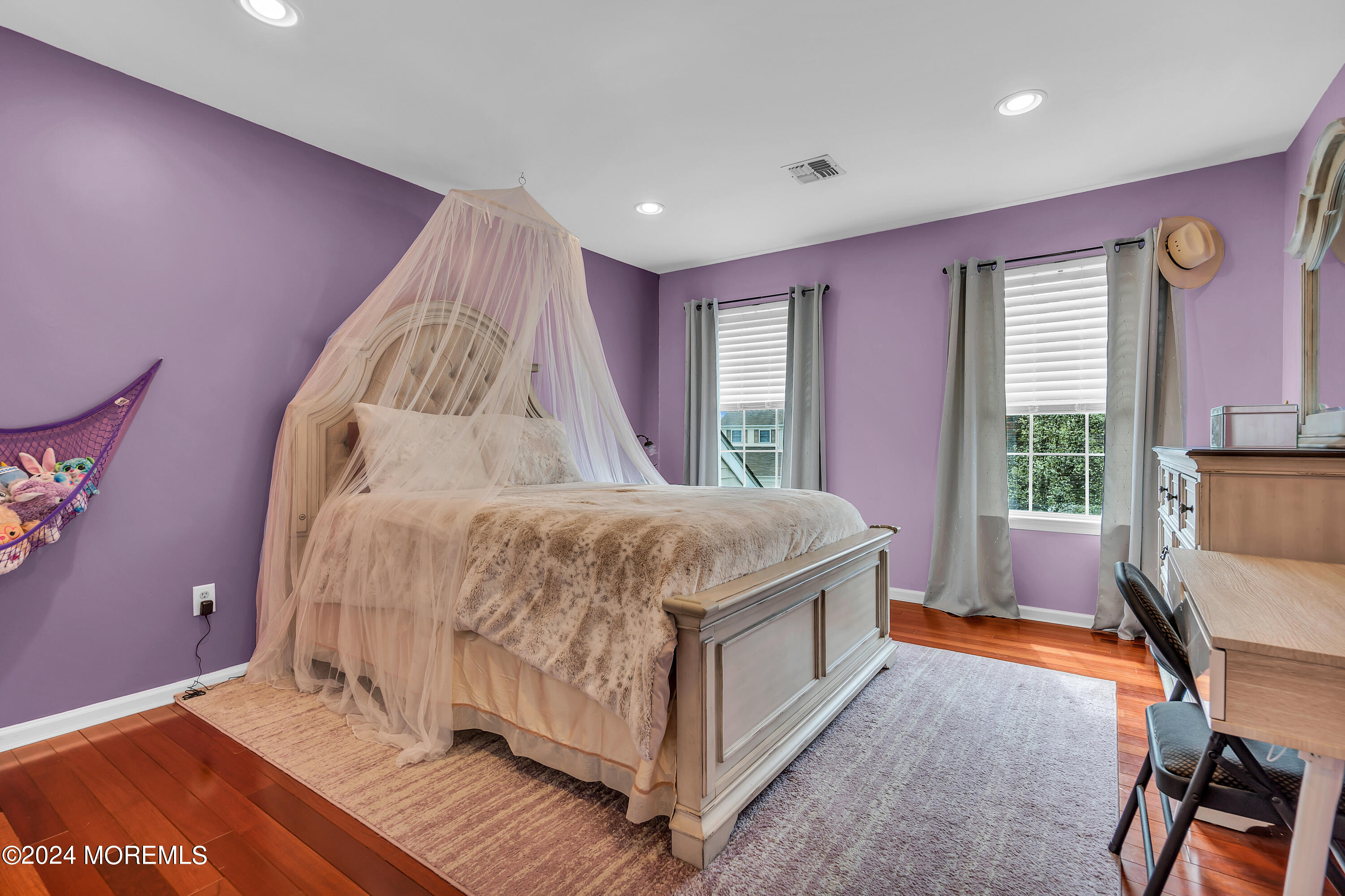 17 Gristmill Road Howell, NJ 07731 - Photo 44 of 71 a bed room with a bed and a chair