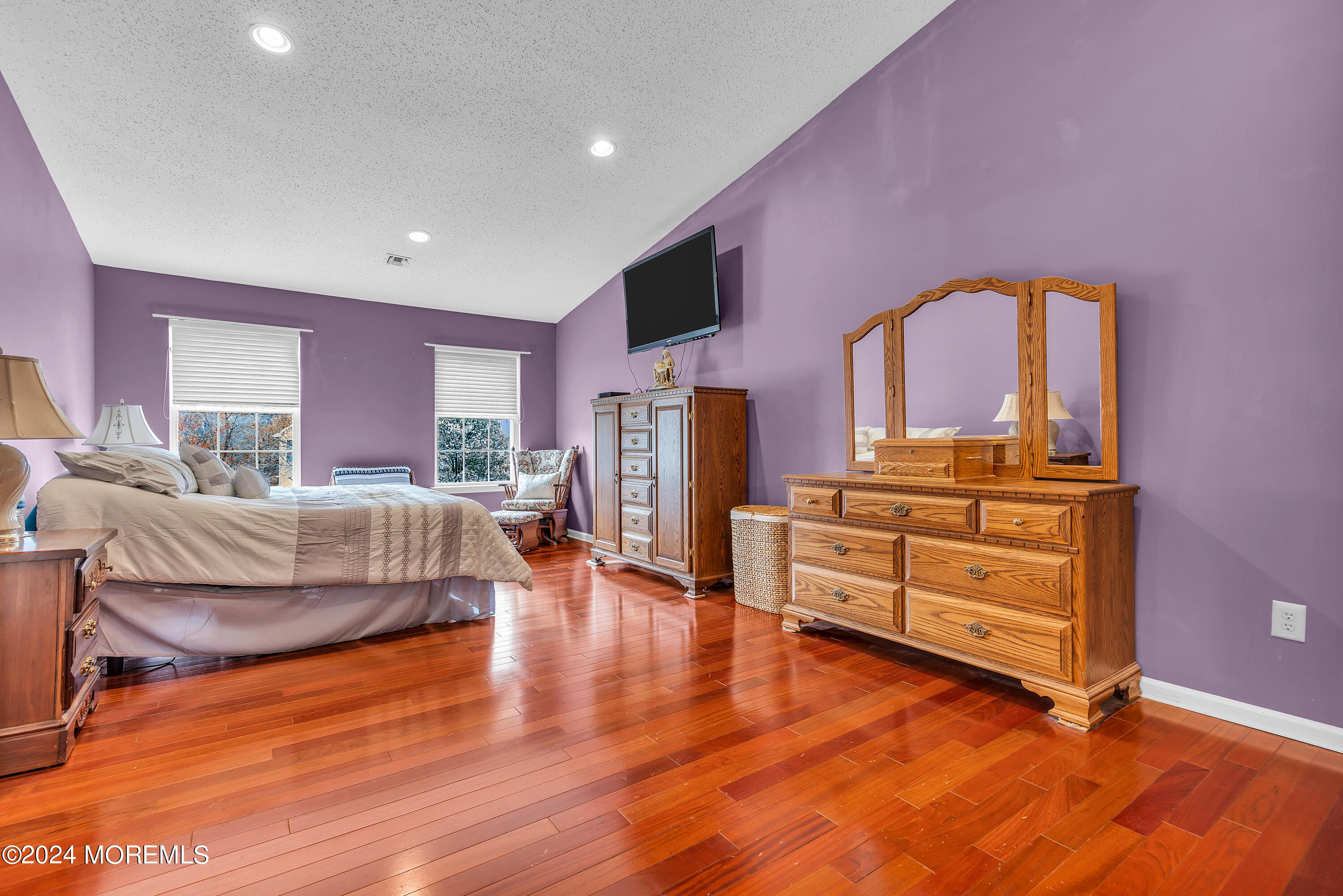 17 Gristmill Road Howell, NJ 07731 - Photo 48 of 71 a living room with furniture and a flat screen tv