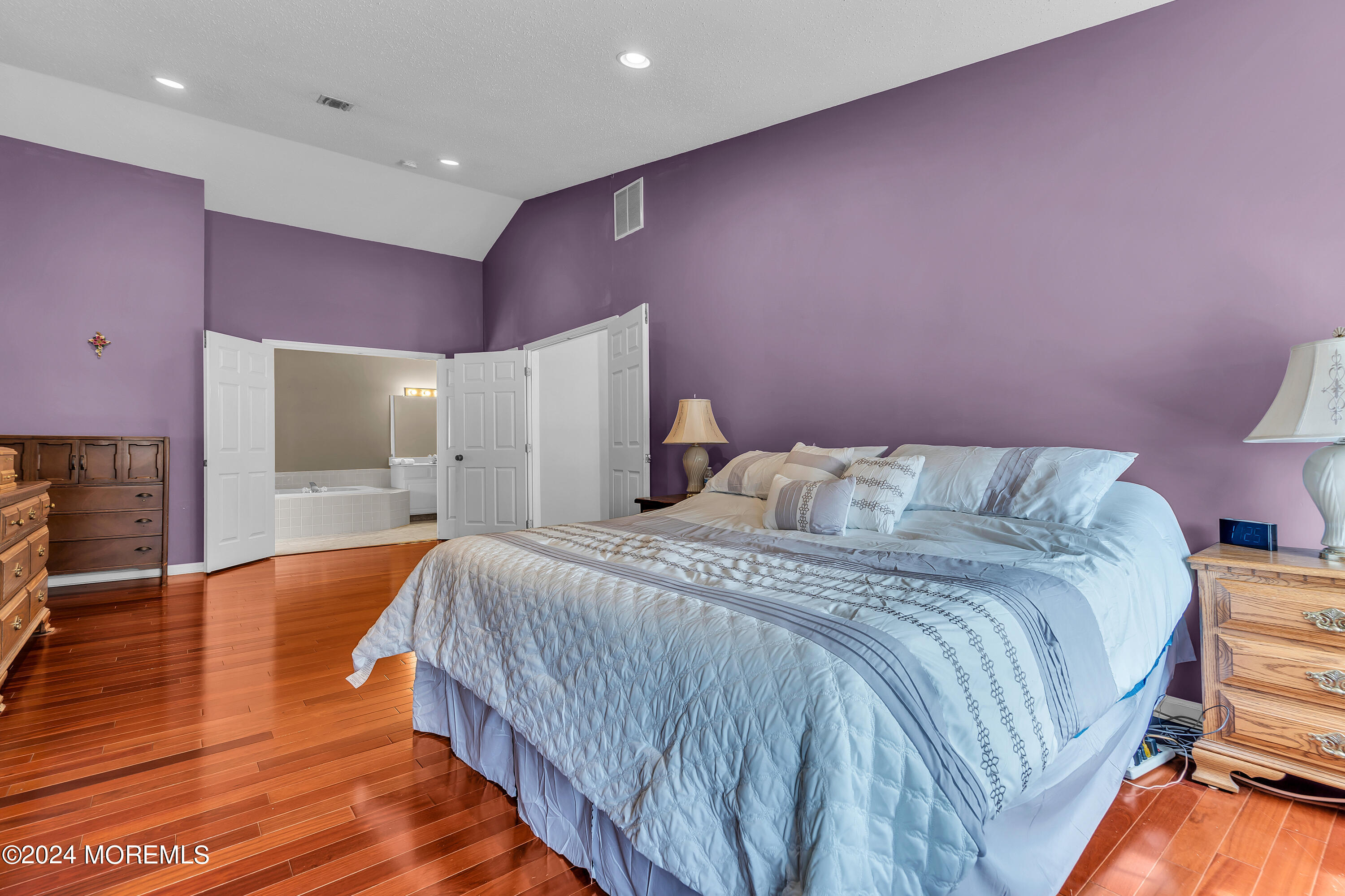 17 Gristmill Road Howell, NJ 07731 - Photo 49 of 71 a bedroom with a bed and closet with wooden floor