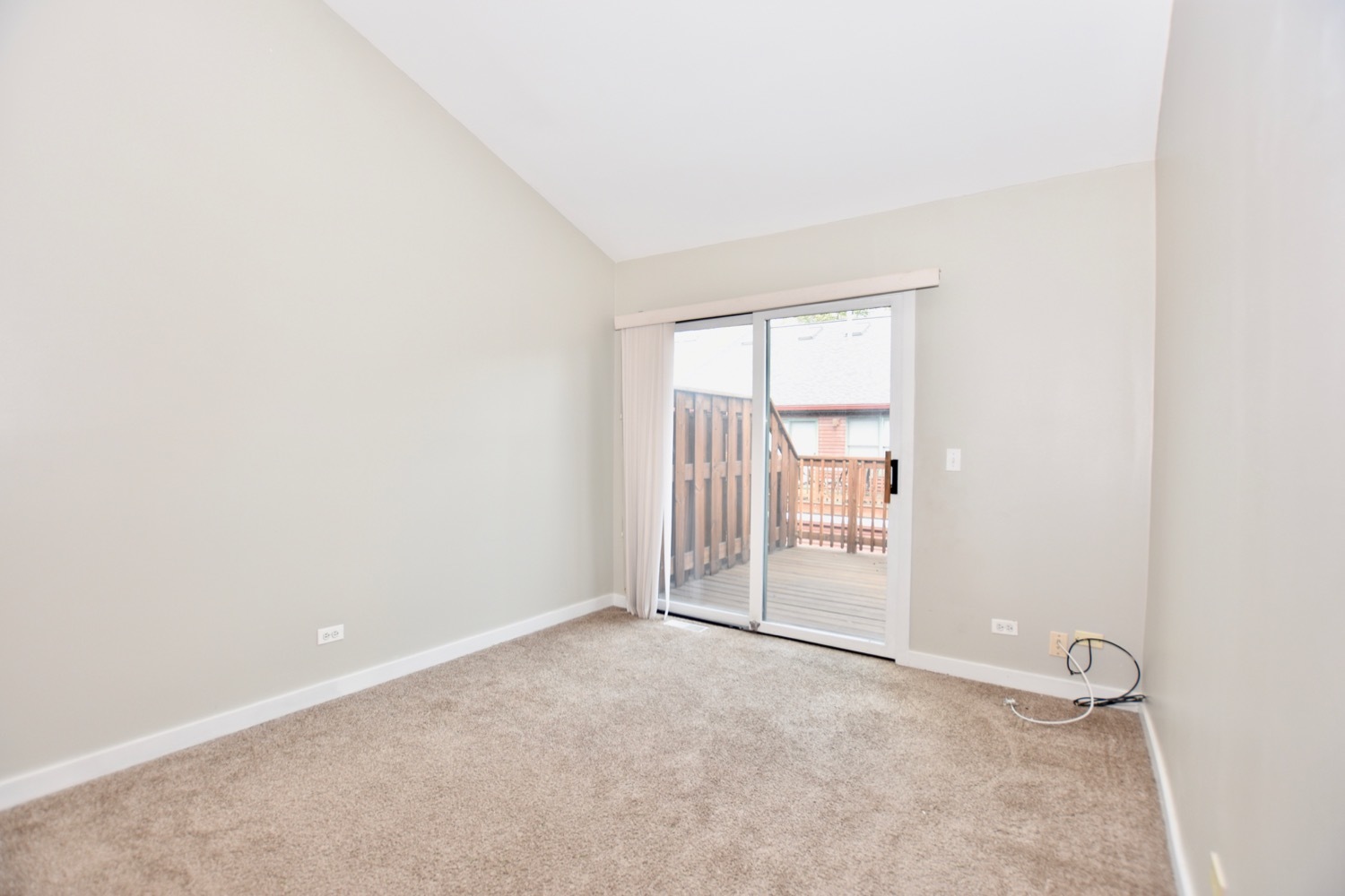 1801 West Diversey Parkway, Unit 18 Chicago, IL 60614 - Photo 12 of 32 a view of an empty room with a window