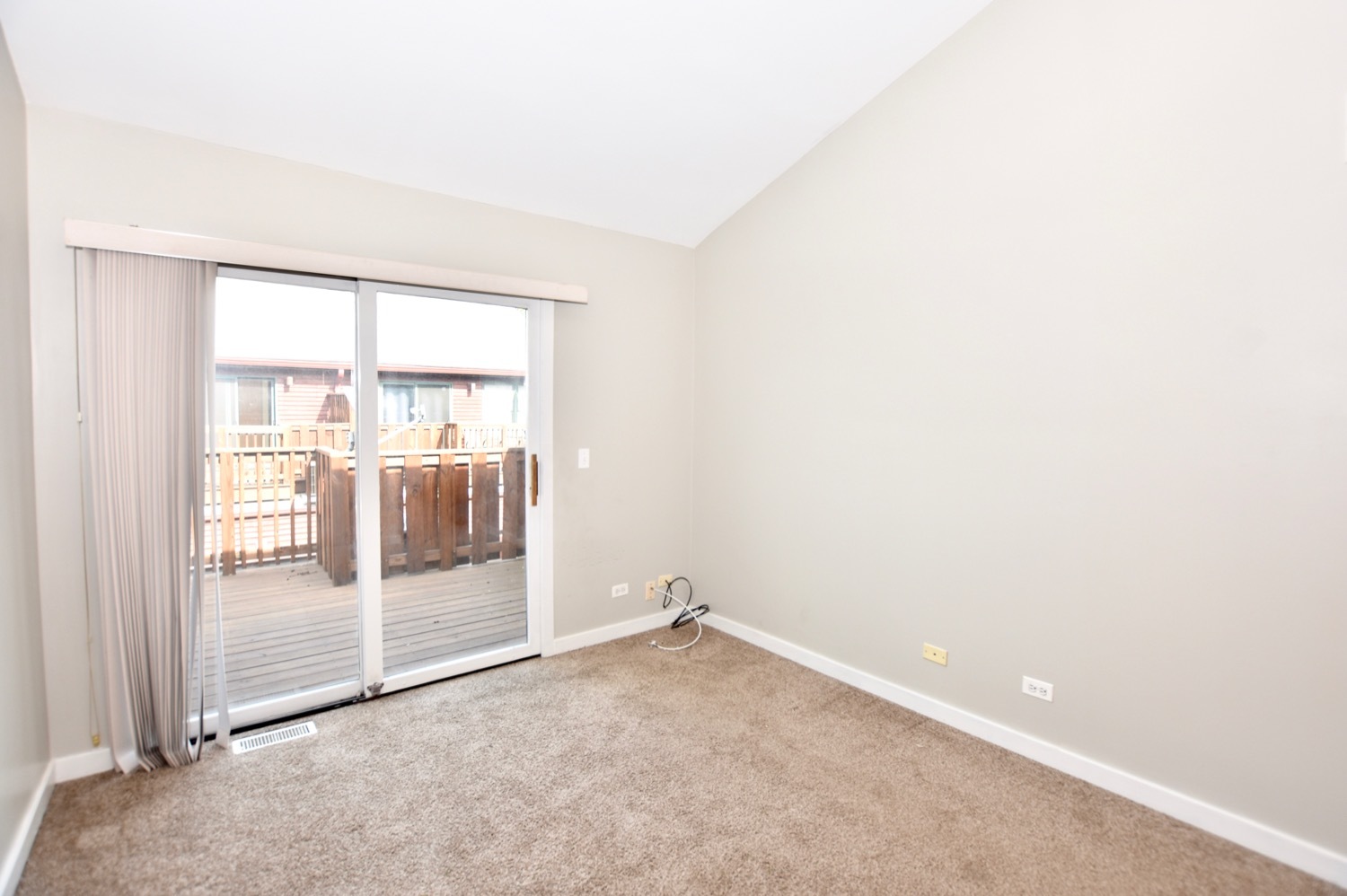 1801 West Diversey Parkway, Unit 18 Chicago, IL 60614 - Photo 14 of 32 an empty room with sliding glass door and shower