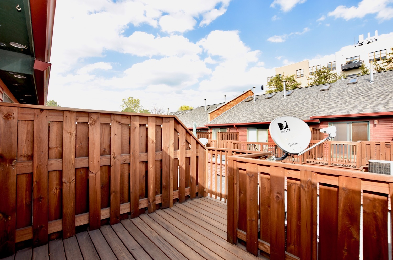 1801 West Diversey Parkway, Unit 18 Chicago, IL 60614 - Photo 15 of 32 a view of a house with wooden fence