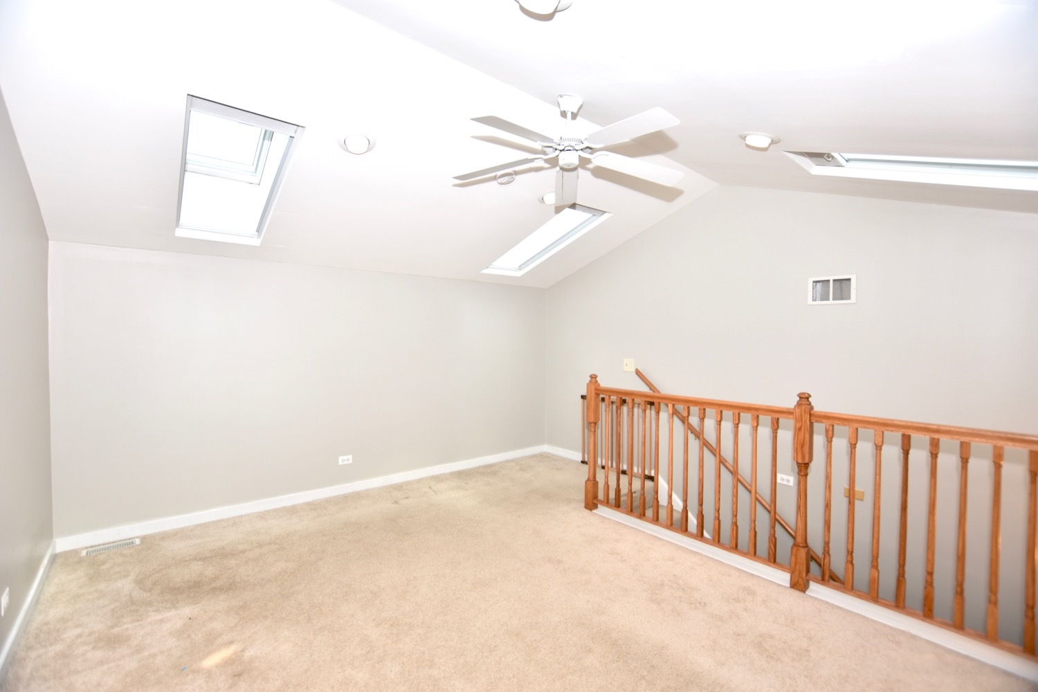 1801 West Diversey Parkway, Unit 18 Chicago, IL 60614 - Photo 25 of 32 a view of a hallway with a ceiling fan