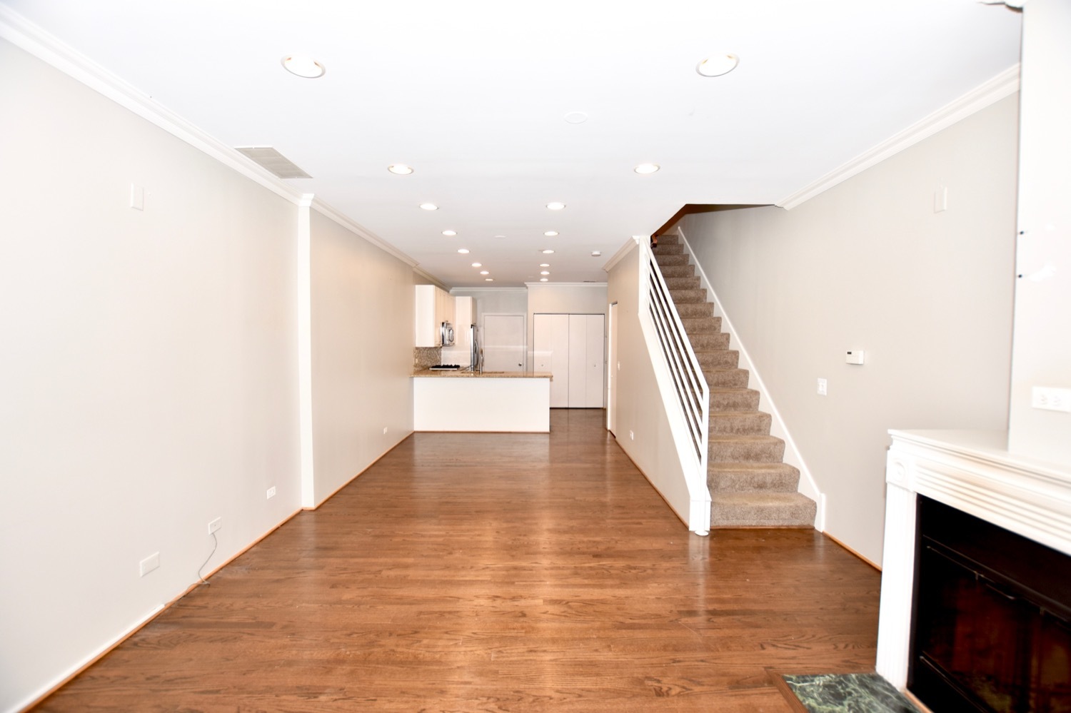 1801 West Diversey Parkway, Unit 18 Chicago, IL 60614 - Photo 4 of 32 a view of entryway and hall with wooden floor