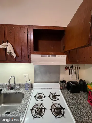 a bathroom with a toilet and a sink