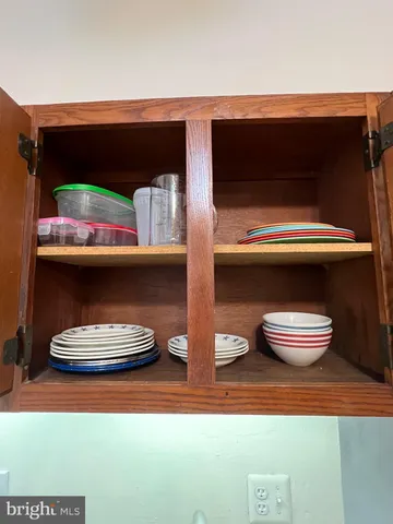 a bathroom with a shower and toilet