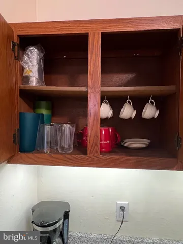 a bathroom with a toilet a sink and a shower
