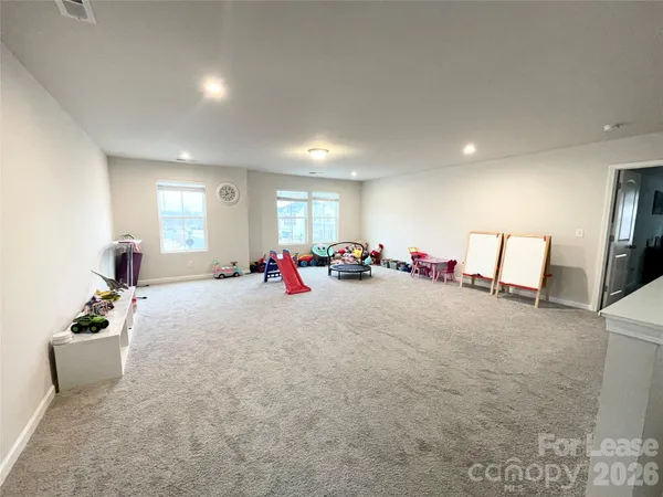 a very nice looking room with furniture and a flat screen tv