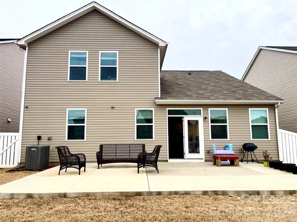 a view of a house with patio