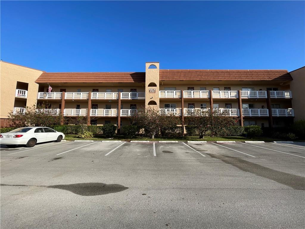 a building with trees in front of it