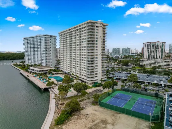 a view of lake with green space