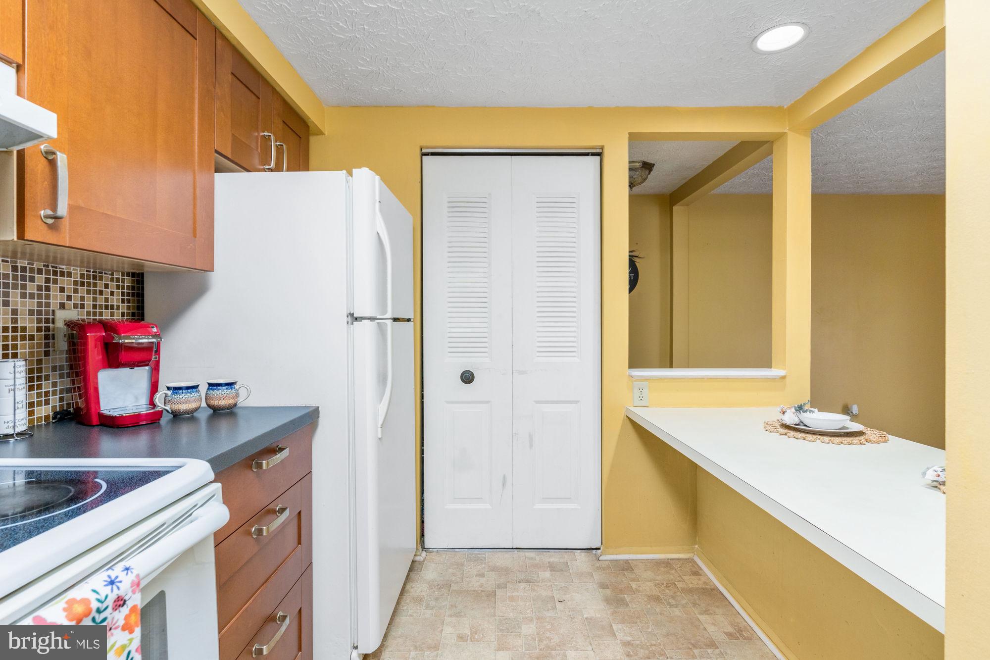 4420 Groombridge Way, Unit 4420E Alexandria, VA 22309 - Photo 17 of 39 Spacious pantry in a condo!