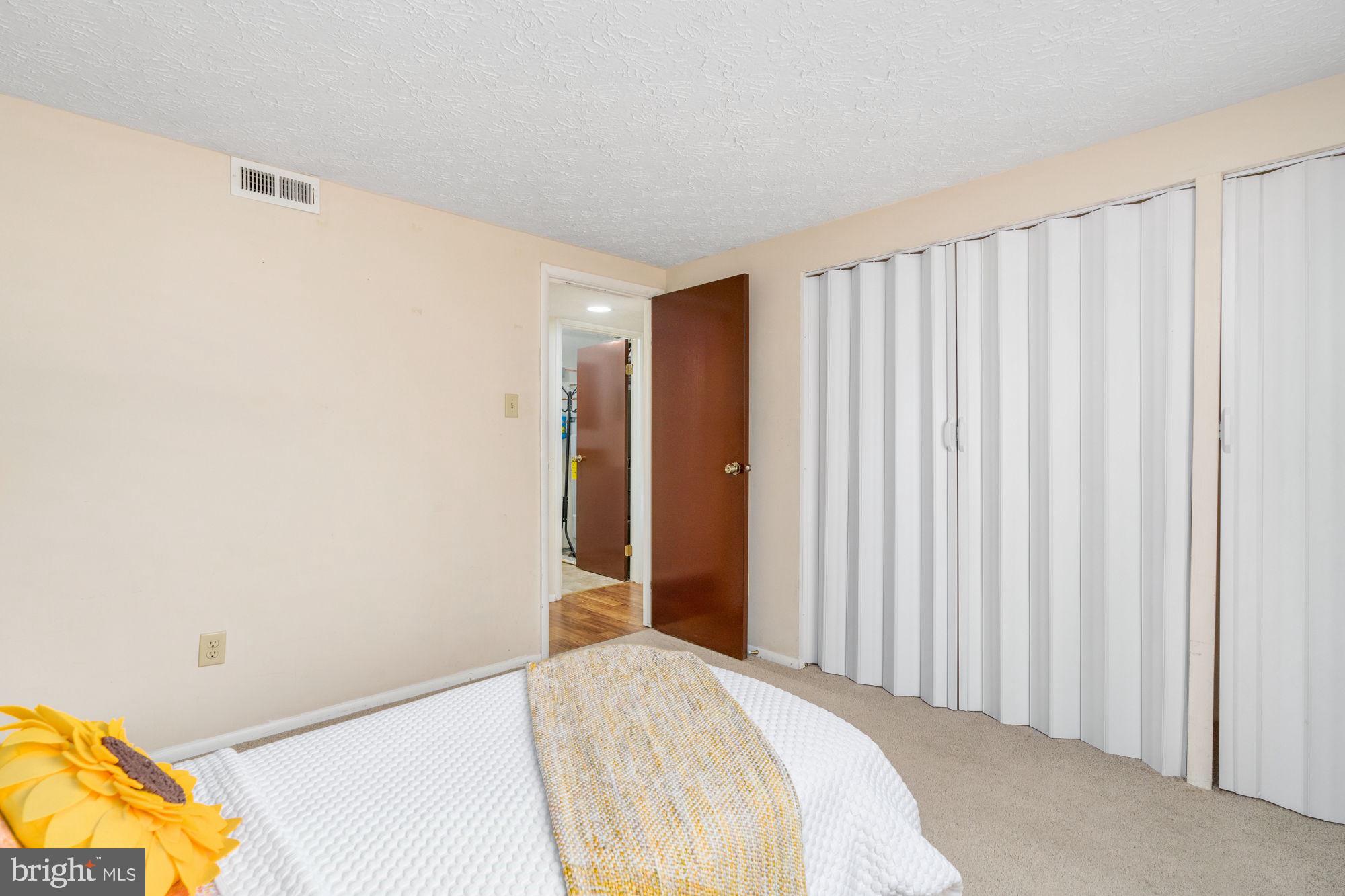 4420 Groombridge Way, Unit 4420E Alexandria, VA 22309 - Photo 19 of 39 NEW closet doors! Carpet cleaned and stretched!