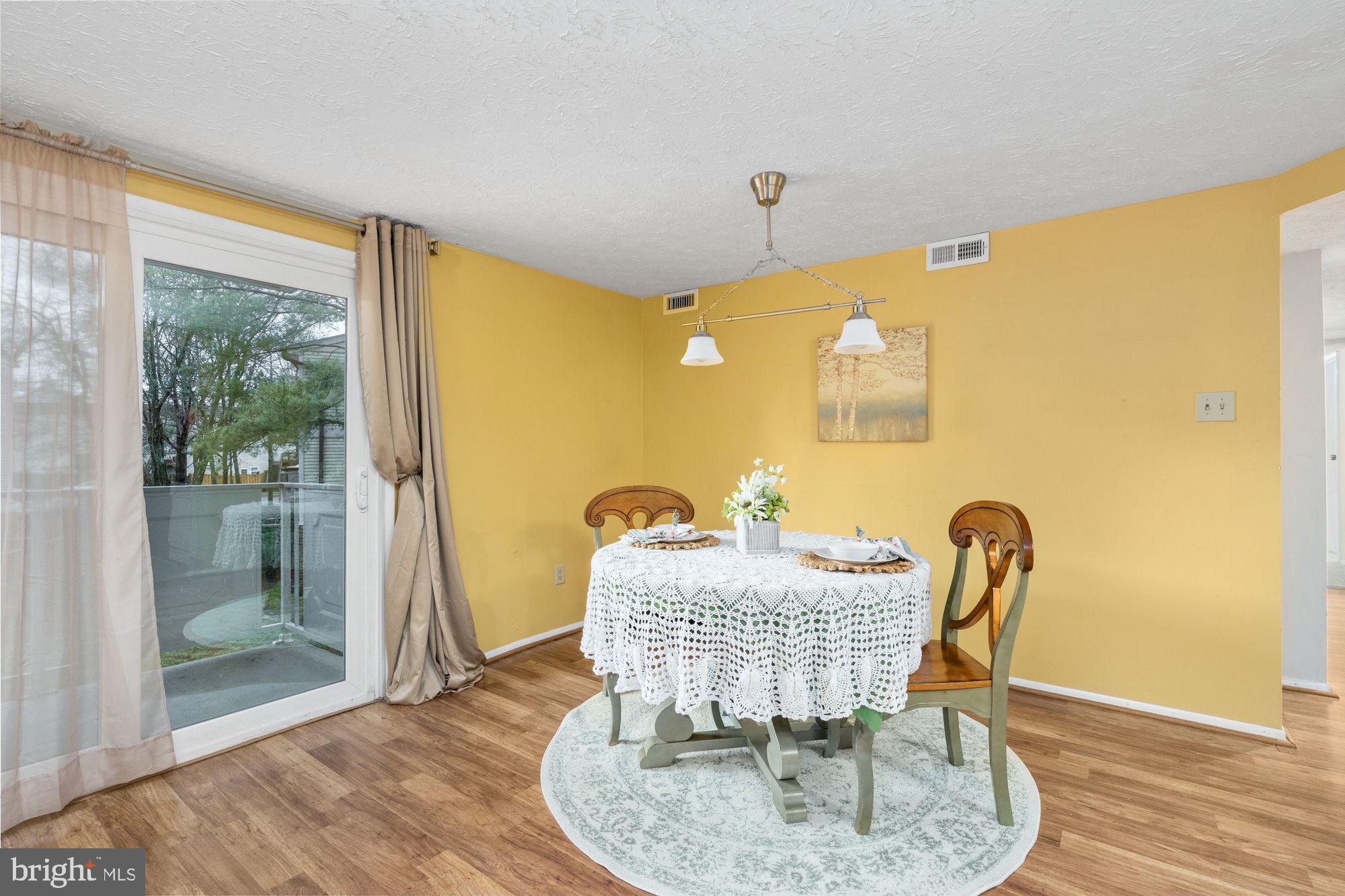 4420 Groombridge Way, Unit 4420E Alexandria, VA 22309 - Photo 7 of 39 Sliding door and balcony off dining area