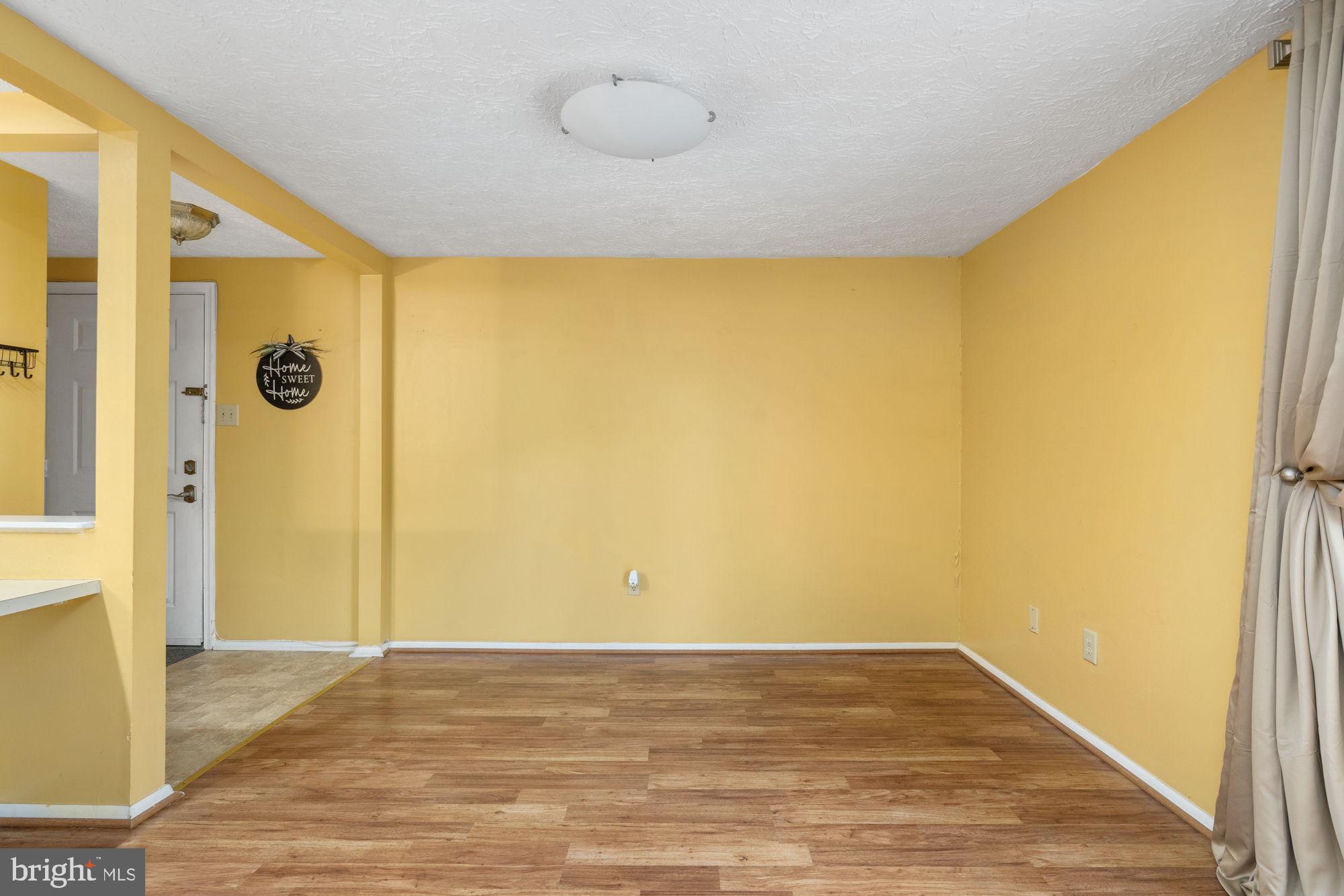 4420 Groombridge Way, Unit 4420E Alexandria, VA 22309 - Photo 10 of 39 Family living room open to dining and kitchen