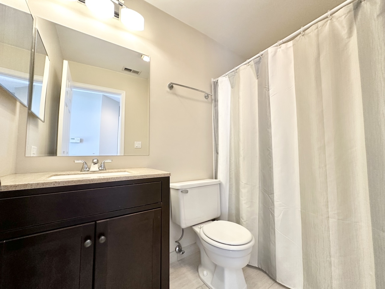 1193 Ranchview Court Buffalo Grove, IL 60089 - Photo 16 of 19 a bathroom with a sink and a toilet