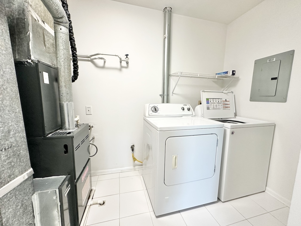 1193 Ranchview Court Buffalo Grove, IL 60089 - Photo 17 of 19 a utility room with dryer and washer