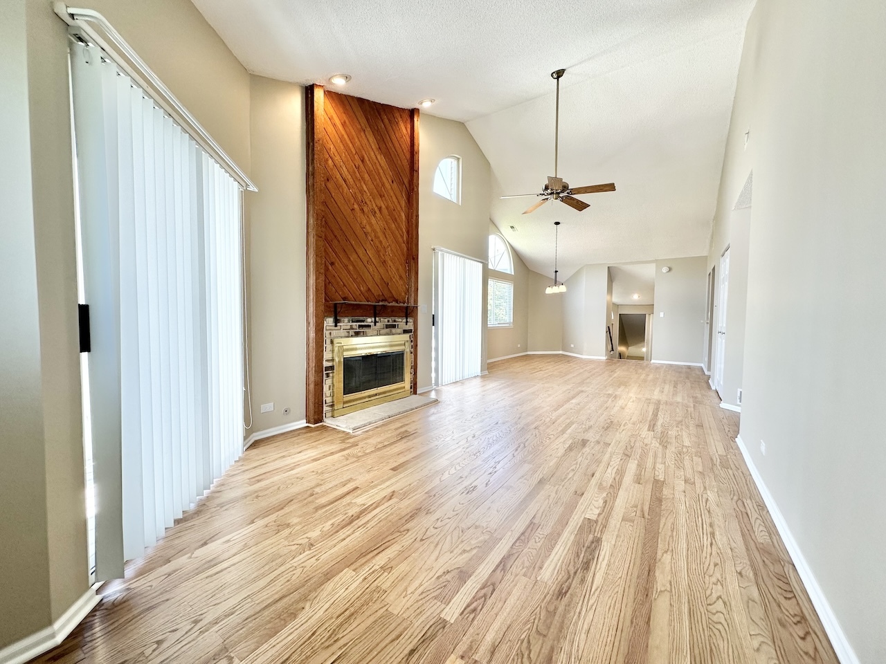 1193 Ranchview Court Buffalo Grove, IL 60089 - Photo 10 of 19 a view of a kitchen with wooden floor and a ceiling fan