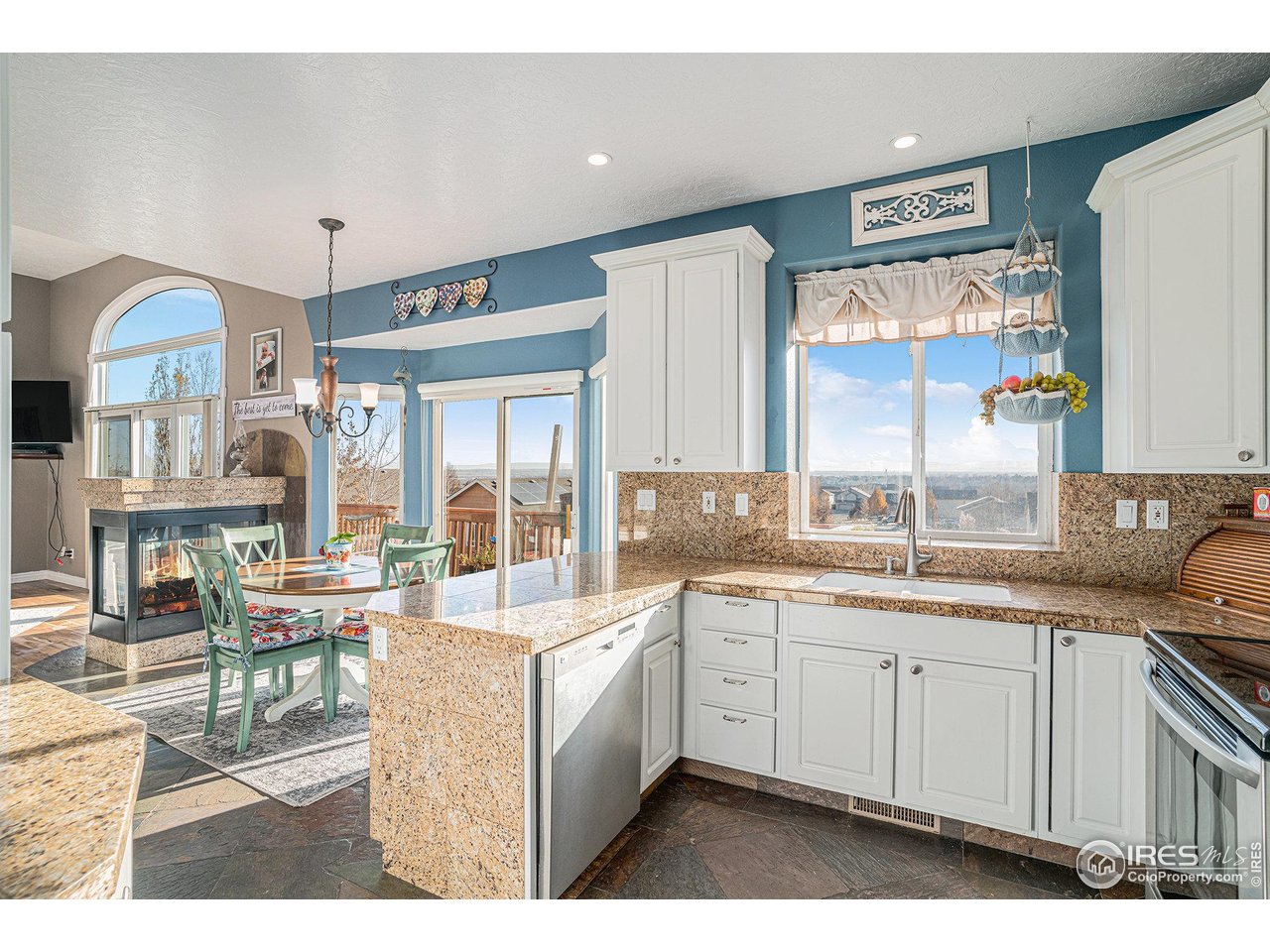 4402 30th Street Greeley, CO 80634 - Photo 11 of 31 a kitchen with lots of counter top space