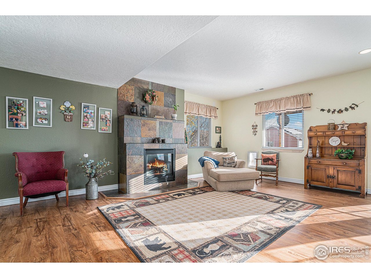 4402 30th Street Greeley, CO 80634 - Photo 19 of 31 a living room with furniture and a couch