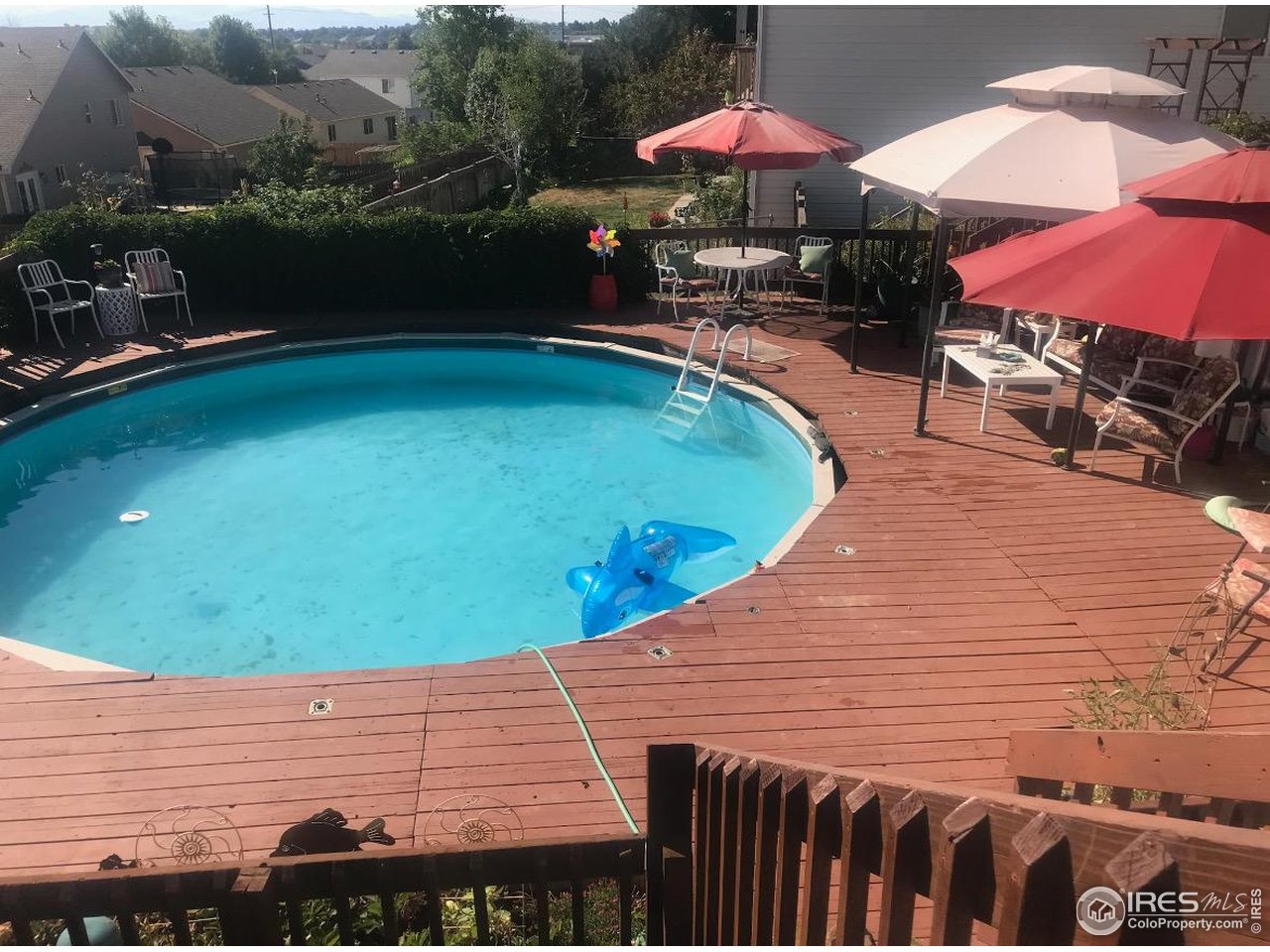 4402 30th Street Greeley, CO 80634 - Photo 26 of 31 an outdoor space with pool and furniture