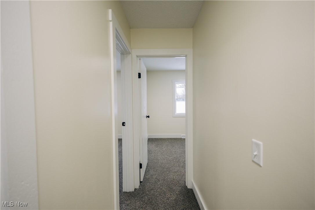 22481 Mountz Road Minerva, OH 44657 - Photo 20 of 36 View of hallway to bedrooms