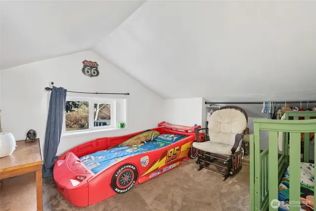 a room with toys and dresser