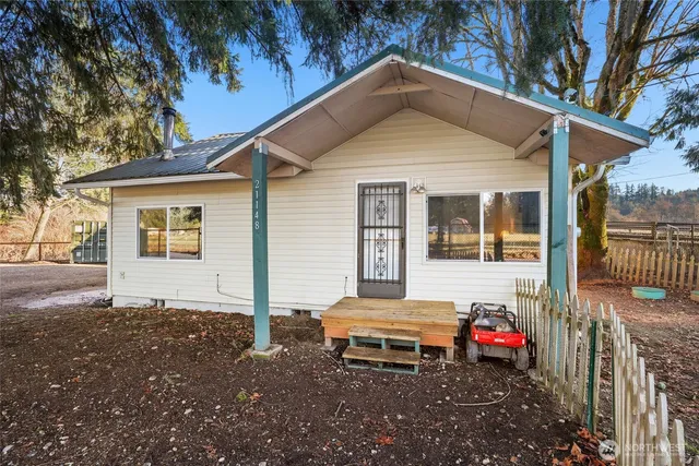 a front view of a house with a porch