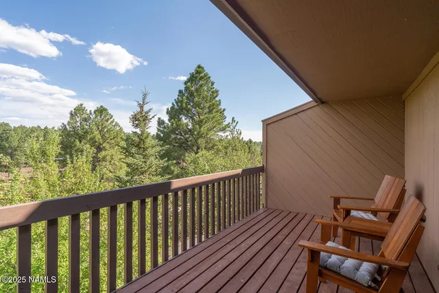 an aerial view of a houses with outdoor space and street view