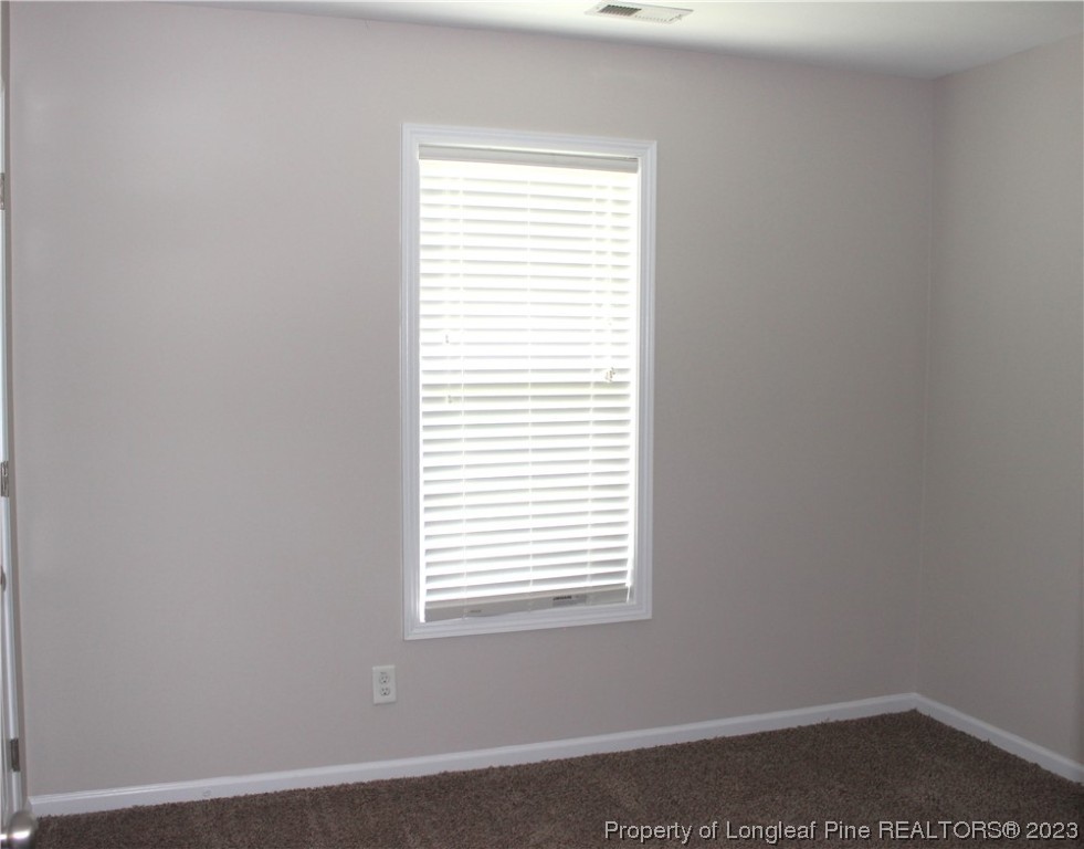 678 Cape Fear Road Raeford, NC 28376 - Photo 18 of 30 an empty room with a window