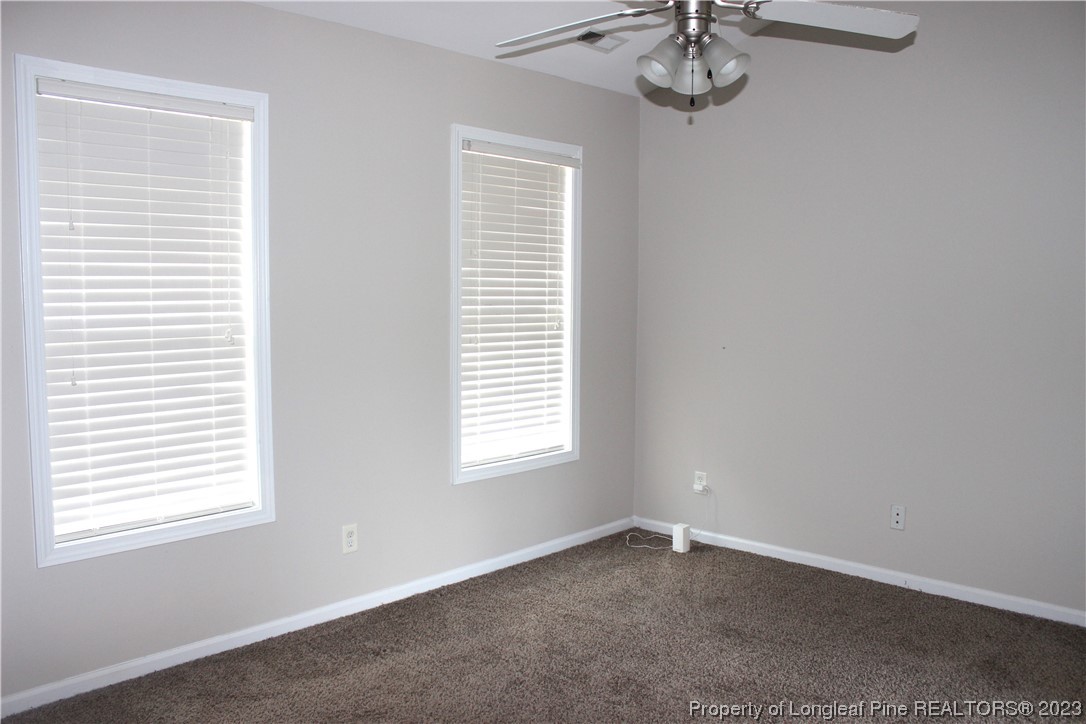 678 Cape Fear Road Raeford, NC 28376 - Photo 21 of 30 an empty room with a window